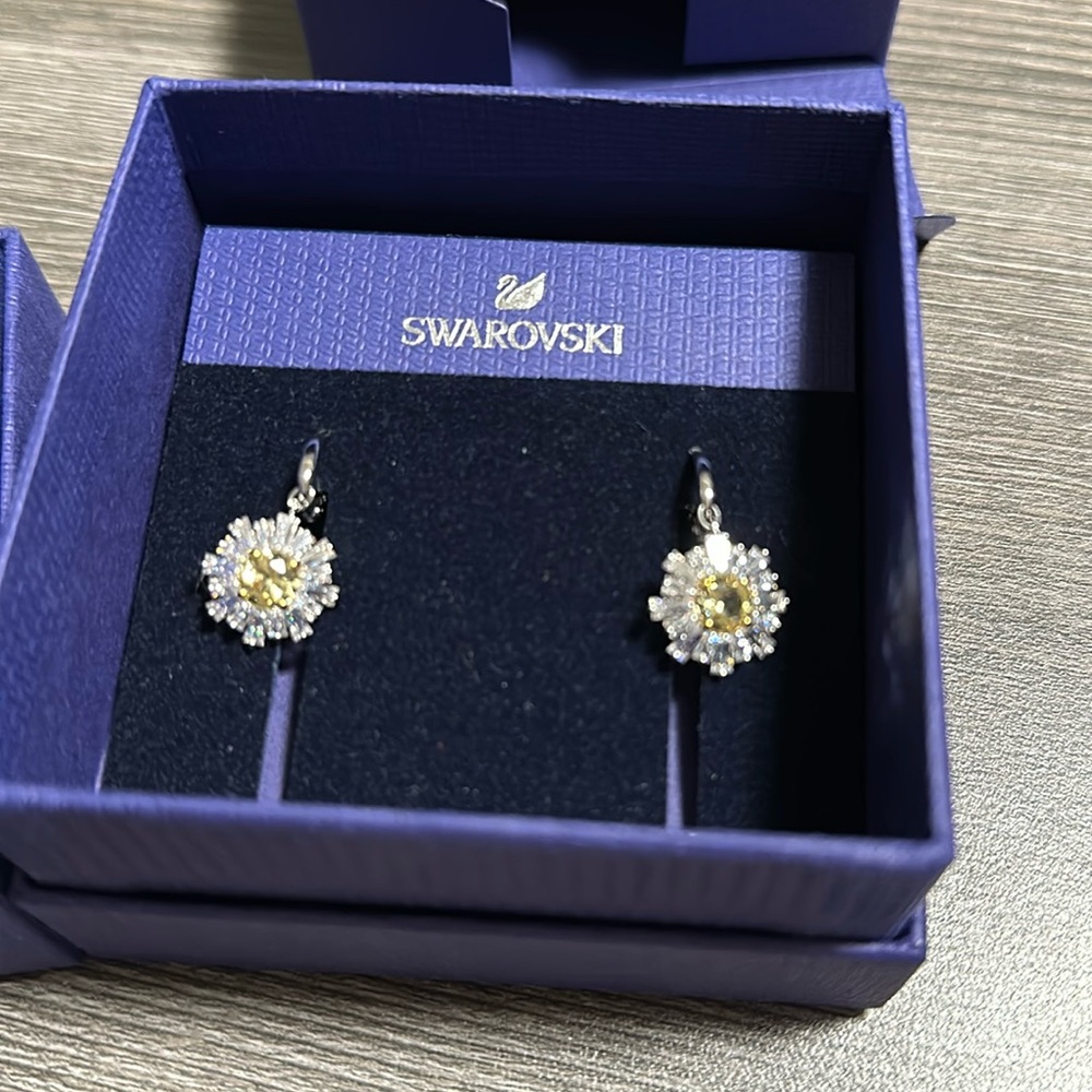 Authentic Swarovski sunburst earrings
